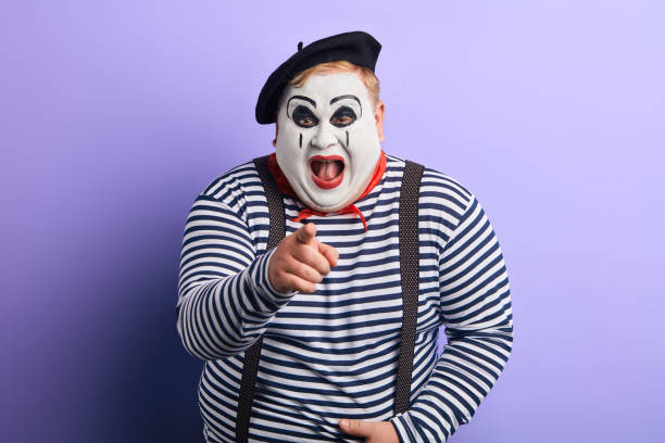 istock laughing crazy plump mime points with finger at you 1227292256