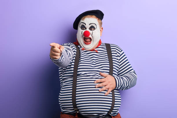 istock crazy artist indicates with finger , close up photo. 1227292303