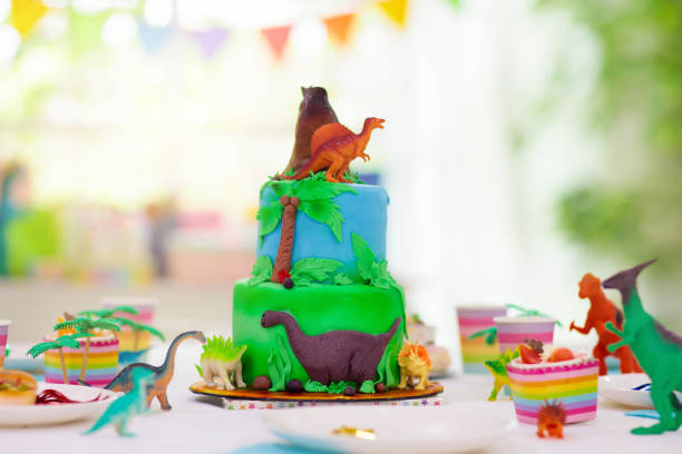istock Kids birthday party. Dinosaur theme cake. 1227292416