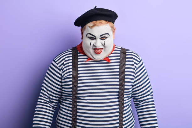 istock cruel ugly fat clown laughing at the camera 1227293050