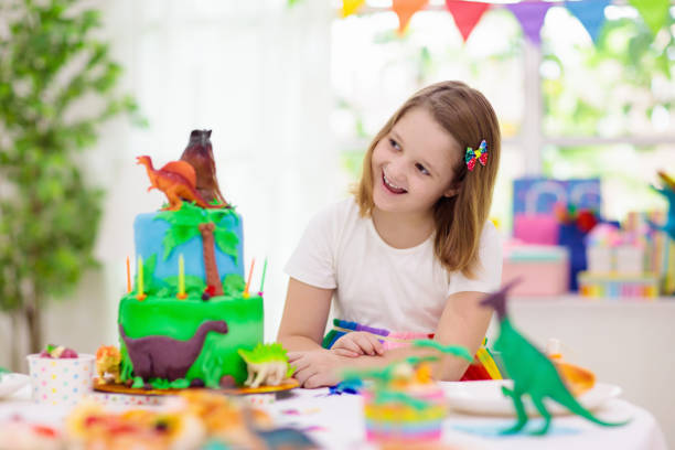 istock Kids birthday party. Dinosaur theme cake. 1227293111