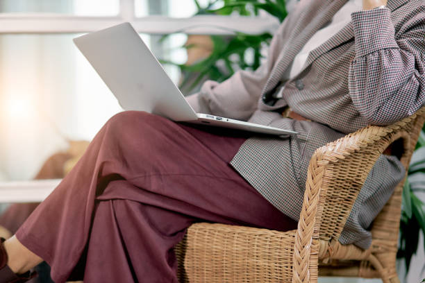 istock cropped successful business lady sitting with laptop 1227295402
