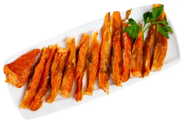 Photo of Smoked salmon belly strips on plate