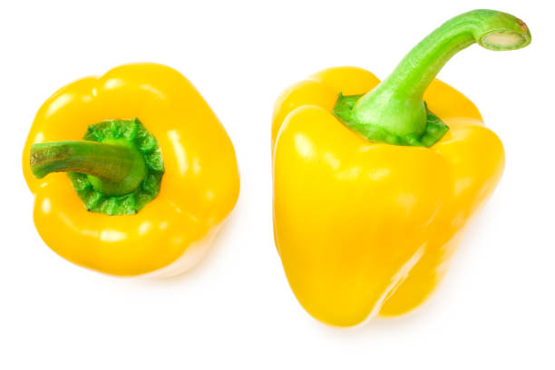 yellow sweet bell peppers isolated on white background
