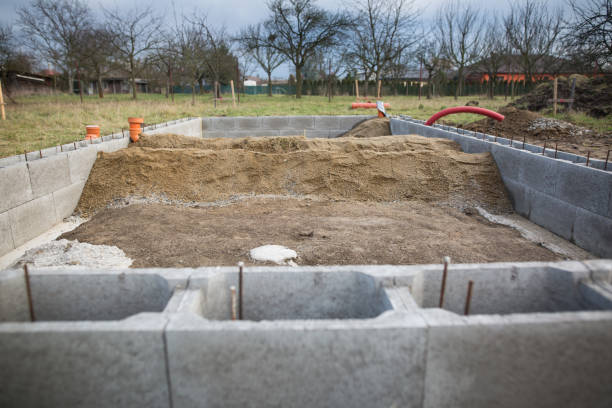 istock Foundations of the house, unfinished bungalow, rough construction 1227300482