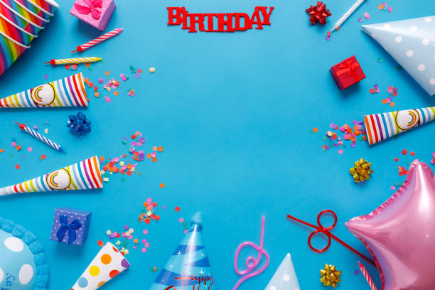 istock flatlay Birthday party card on a blue background with copy space for text 1227301150