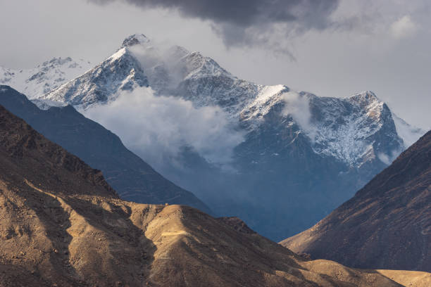 istock Snow Karakoram mountains peak view from Gilgit, Pakistan 1227302451