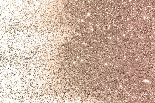 Rose gold glitter sparkles on white background Rose gold sparkles on white background for your design rose gold glitter stock pictures, royalty-free photos & images