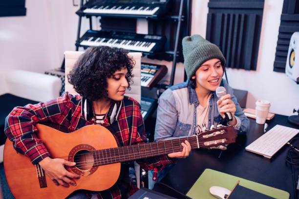 istock Girls working in the music studio 1227307090