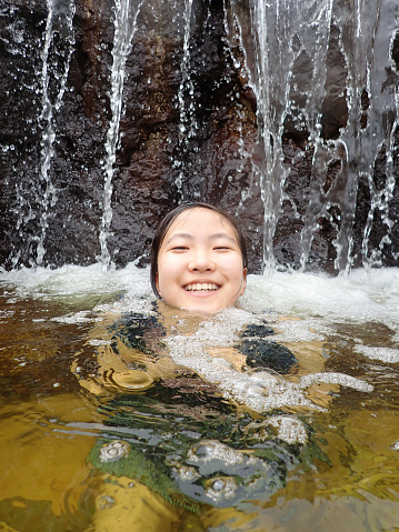 Japanese girl enjoys having hot spring