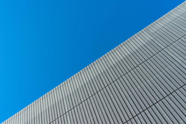 istock Low Angle View Of Modern Building Against Clear Blue Sky 1227313913