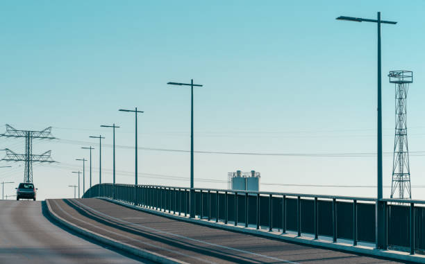 istock Bridge Wirh Lamps Against Clear Sky 1227314083