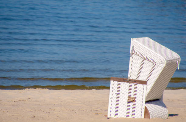 istock Hooded Beach Chair On Shore 1227314450