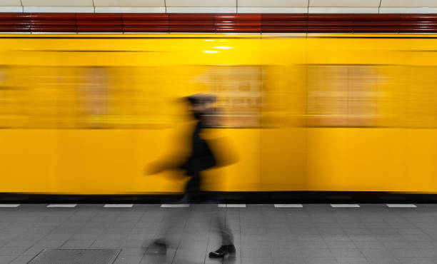 istock Blurred Motion Of Train At Railroad Station 1227314463