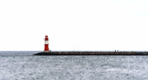 istock Lighthouse By Sea Against Clear Sky 1227315125