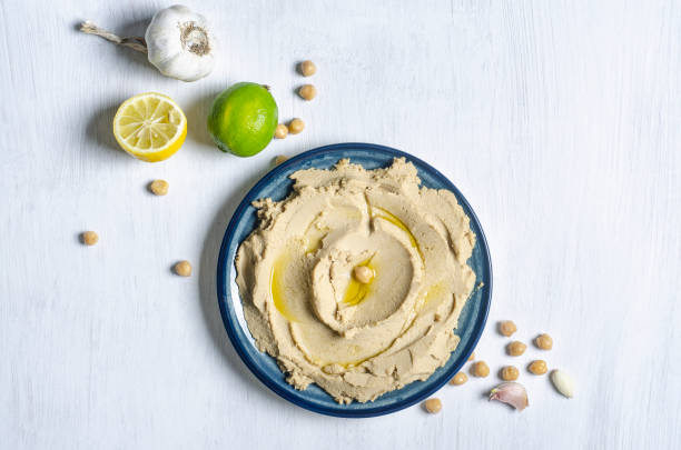 hummus on white kitchen table
