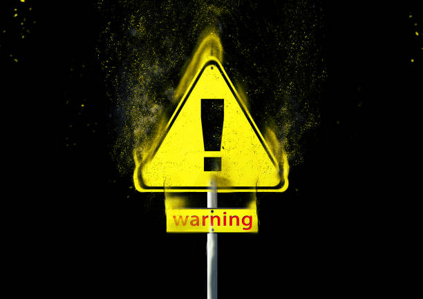 istock 3D illustration of black background with abstract exploding danger signs 1227316860