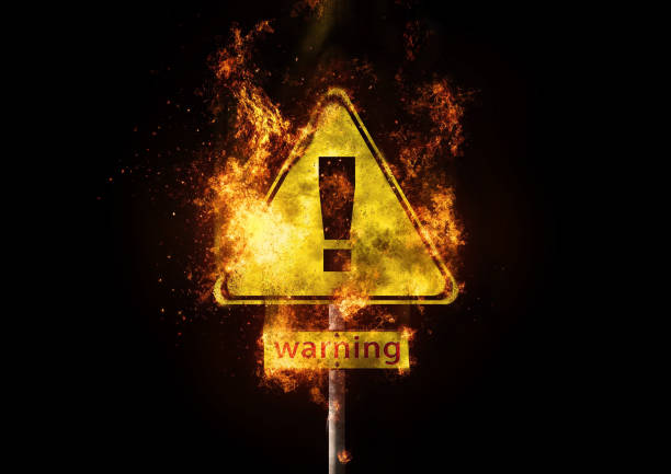 istock 3D illustration of black background with abstract exploding danger signs 1227316868