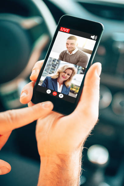 istock man doing a voip call in the car 1227322027