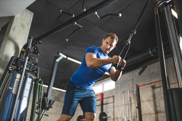 istock Sports man doing exercise for triceps 1227325133