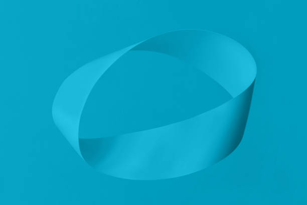 Mobius strip soaring in the air on blue mint background Mobius strip made from paper soaring in the air on blue mint background. Trendy surreal airy image. Abstract 2021 color trend concept composition levitation stock pictures, royalty-free photos & images