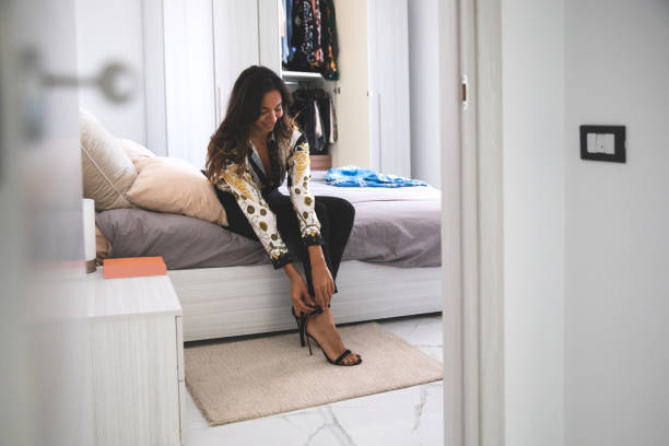 Fahsionable woman getting ready to go out to office