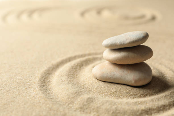 istock Stones on the sand with patterns. Zen concept 1227328573