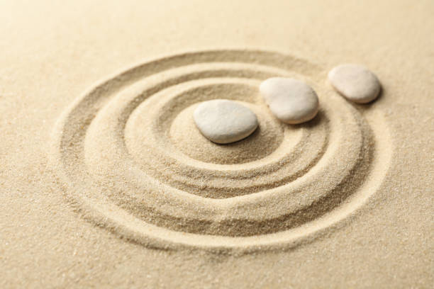 istock Stones on the sand with patterns. Zen concept 1227329927