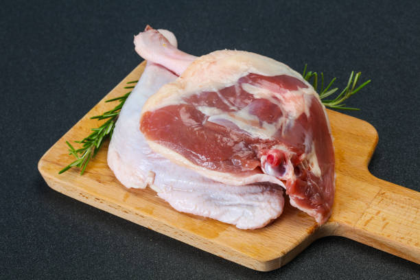 istock Raw duck leg served rosemary 1227330432