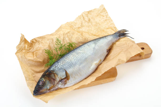 istock Salted herring over the wooden board 1227330460