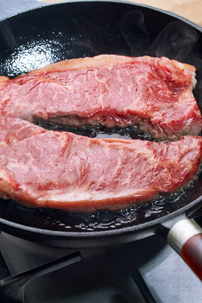istock Beef steak fried in a cast iron skillet 1227331704