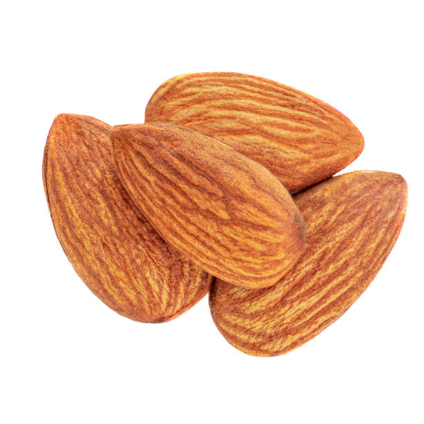istock Almond nuts Isolated on white background. Close-up. Top view 1227332665