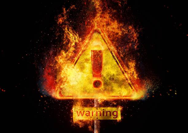 istock 3D illustration of a violently burning danger sign 1227336600