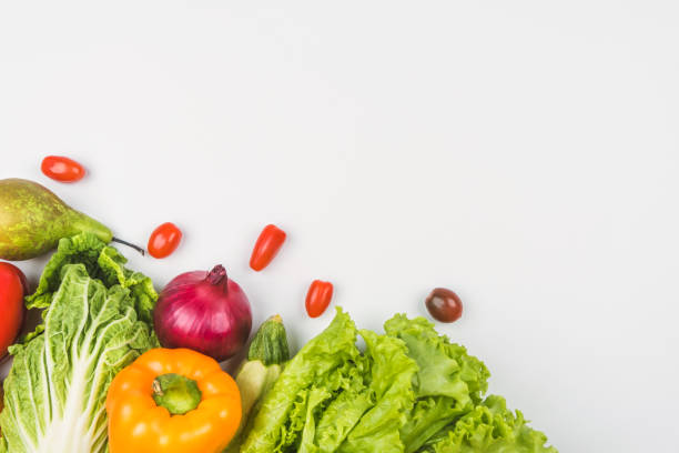 istock Vegetables and fruits on a white background are framed on the left 1227339796
