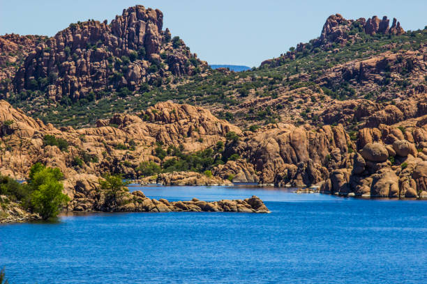 istock Beautiful Mountain Lake With Rock Shoreline 1227341259