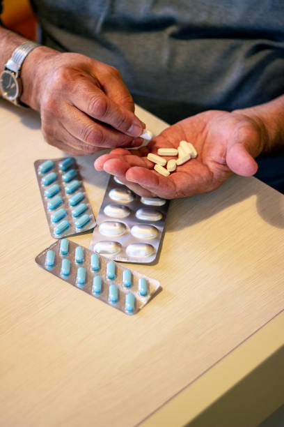 istock Pills and medication in hands 1227341665