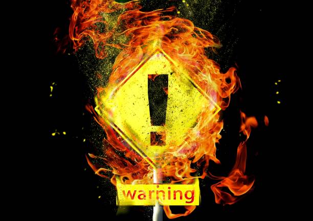 istock 3D illustration of a violently burning danger sign 1227346696