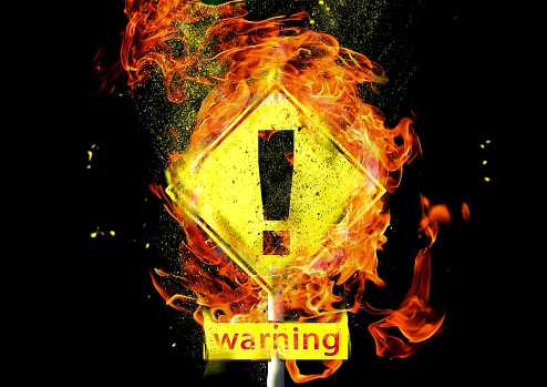 3D illustration of a violently burning danger sign
