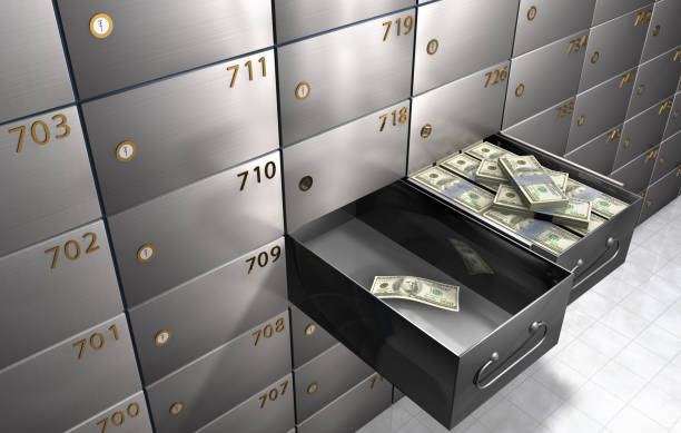 istock conceptual image contrasting an empty and a full safety deposit box. 1227347400