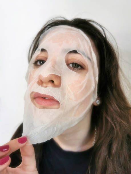 facial makeup mask - teenager body care adolescence human lips imagens e fotografias de stock