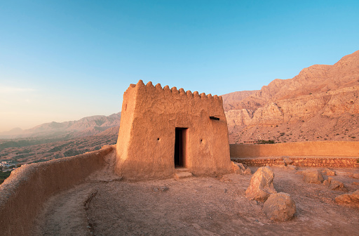 Dhayah Fort in north Ras Al Khaimah United Arab Emirates. Gulf, heritage architecture at sunset