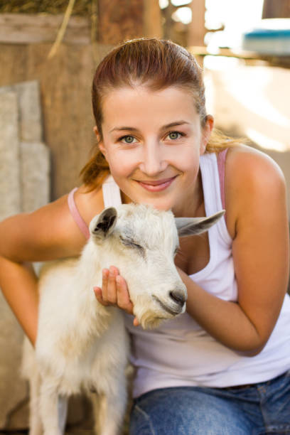 istock girl hugs a little kid 1227349632