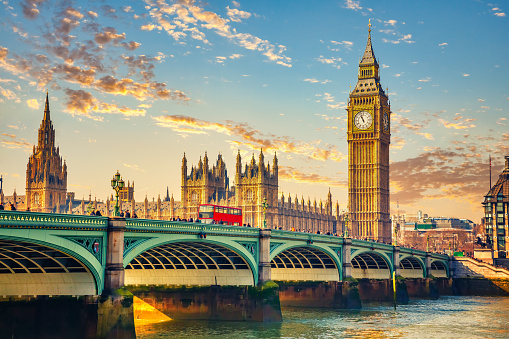 Big Ben and westminster bridge in London at sunrise