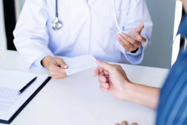 istock Medicine doctor consultant explaining to patient about problem diagnosis. 1227355138