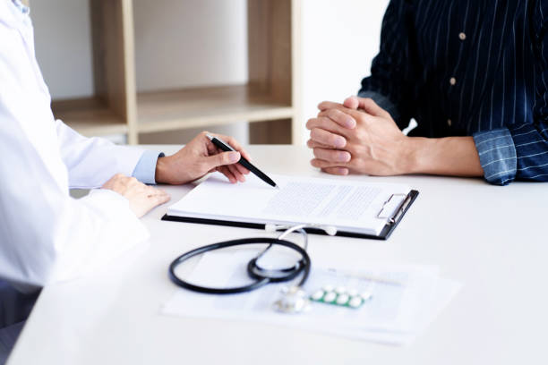 istock Medicine doctor consultant explaining to patient about problem diagnosis. 1227355152