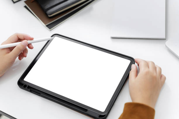istock Hands of women with empty blank screen tablet. 1227355171