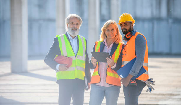 istock Portrait of Construction Site Project Colleagues and Foreman 1227356655