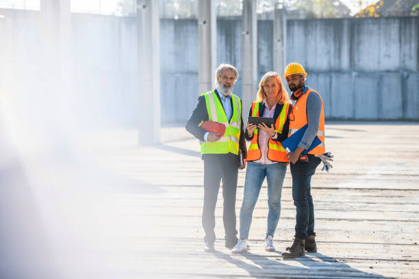 istock Portrait of Project Team Meeting at Construction Site 1227356656