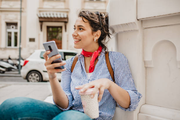 istock A young beautiful woman enjoys her free time 1227357109