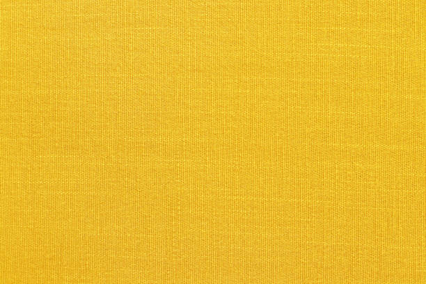istock Yellow linen fabric cloth texture background, seamless pattern of natural textile. 1227359691